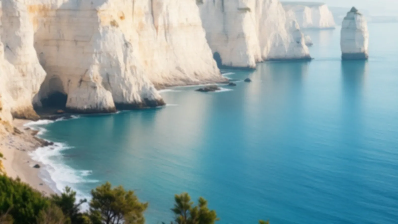 Pale ivory sea cliffs above calm turquoise water in soft morning light, the NoteIvory view of personal loans with clear terms, $100 – $5,000